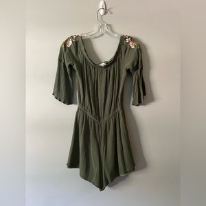 Francesca’s Green romper size -M with floral accents on sleeves.